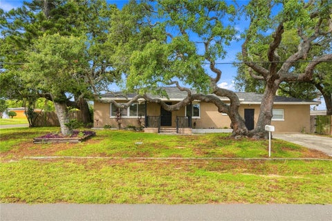 Photo of 10719 Cherokee Drive, St Petersburg, FL 33708 (MLS # TB8555089)