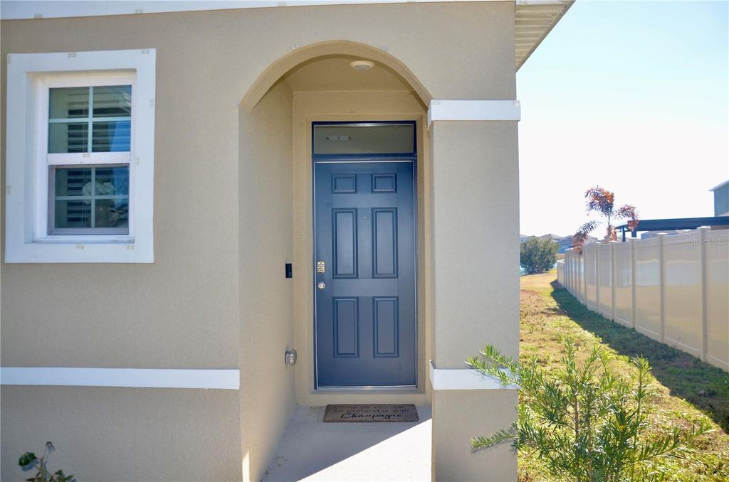 Photo of 216 Eagleview Loop, Davenport, FL 33837 (MLS # S5143064)