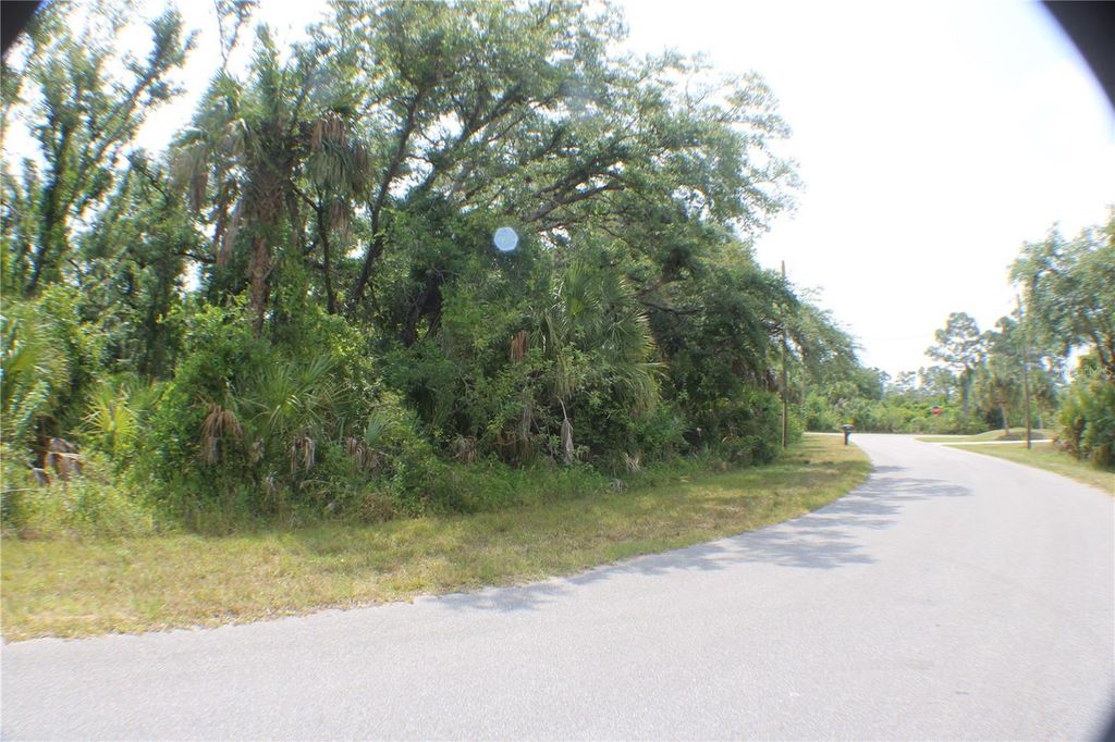 Photo of 15069 Amity Avenue, Port Charlotte, FL 33953 (MLS # C7505344)