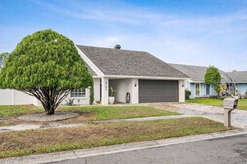 Photo of 8706 Osage Drive, Tampa, FL 33634 (MLS # TB8482029)