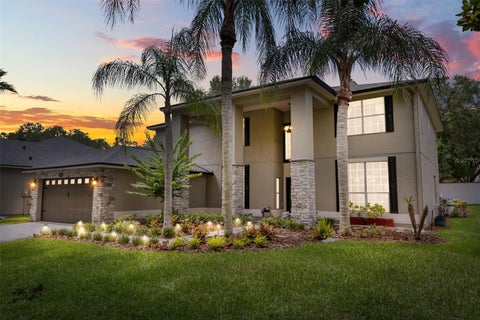 Photo of 7766 Bardmoor Hill Circle, Orlando, FL 32835 (MLS # O6416454)