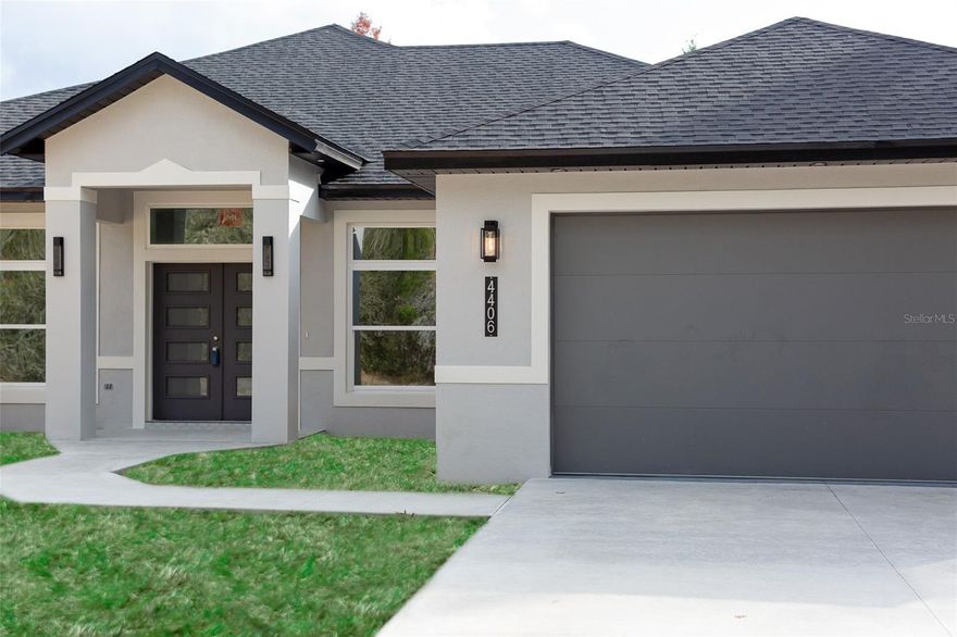 One or more photo(s) has been virtually staged. Under Construction. Under Construction! More photos to come! Welcome to this thoughtfully designed new construction contemporary farmhouse, ideally located on a corner lot at the end of a quiet dead-end street, offering privacy and ample space. This 4-bedroom, 3-bathroom home showcases upgraded finishes from the moment you arrive, featuring an extra-long driveway and a striking tile entry that sets the tone for the rest of the home.
The open-concept kitchen is beautifully appointed with 42-inch soft-close cabinetry, a large waterfall island, a built-in wine fridge, and additional upgrades that enhance both function and style. Every detail has been carefully selected, from the garage to the expansive covered back porch, creating a seamless blend of comfort and refined design.
The oversized back porch offers multiple access points, including convenient access to a bathroom, making it ideal for indoor-outdoor living and entertaining. With luxury details throughout and a peaceful setting, this home delivers quality craftsmanship and modern farmhouse appeal.Schedule your private tour to experience the space, upgrades, and thoughtful design firsthand.