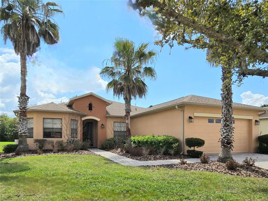 BEAUTIFUL BOCA RATON MODEL HOME in 55+Solivita on a CONSERVATION LOT. This 2 bed/2 bath +Den offers a very open floor plan. There are many upgrades in the home to include an upgraded front elevation, 8 ft doors, rounded corners on walls, 5 1/4 baseboard, laundry room with cabinets and sink, washer & dryer. In the kitchen, you have a nice breakfast bar, cabinets with slide-out drawers, a backsplash, a newer microwave, and a stove. There is a wonderful, LARGE SCREEN ROOM overlooking the peaceful wooded conservation lot. NEW ROOF in 2025! The FURNITURE IS NEGOTIABLE if you want to move right in and start enjoying this beautiful community! The HOA includes High-Speed Internet, Streaming TV, Lawn & Shrub maintenance, Irrigation, Guard-Gated Security, and Amenities. This fabulous community has 14 heated pools, 1 is indoors, 2 fitness centers, pickleball, tennis, art studios, a billiards room, 2 golf courses, a dog park, a softball field, and over 200 clubs. There are also 3 restaurants on-site to enjoy. New stores and restaurants across the street! COME ON, ENJOY THE RESORT LIFESTYLE at SOLIVITA!