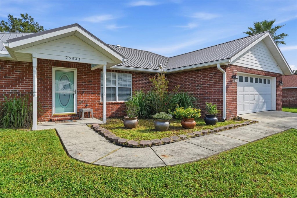Photo of 25542 SW 22nd Place, Newberry, FL 32669 (MLS # GC543362)