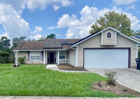 Photo of 5230 Clarion Oaks Drive, Orlando, FL 32808 (MLS # S5129239)