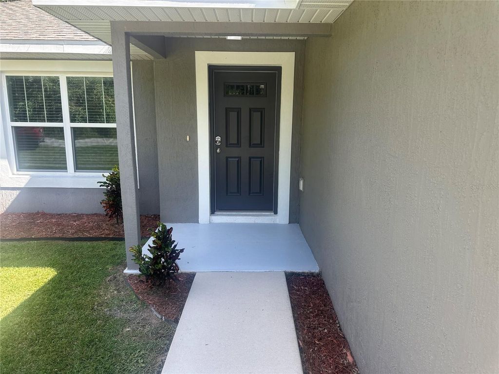 Photo of 13 Locust Drive, Ocala, FL 34472 (MLS # O6355314)