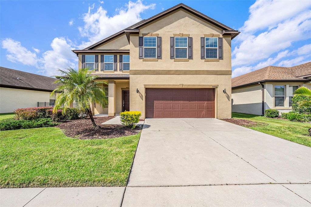 Photo of 30501 Pecan Valley Loop, Wesley Chapel, FL 33543 (MLS # TB8312678)