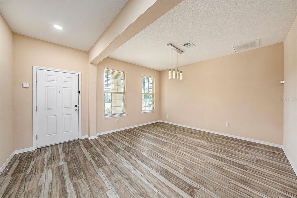 Photo of 30501 Pecan Valley Loop, Wesley Chapel, FL 33543 (MLS # TB8312678)