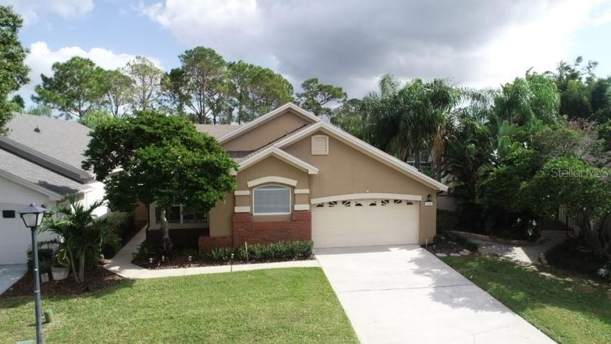 Click the  link on Virtual Tour 1 to view a completed 360 degree virtual tour of property! Immaculately maintained 1-story home.  No rear neighbors, picturesque view of green areas/golf course.NEWER ROOF (Feb. 2021).  NEWER AIR CONDITIONING SYSTEM(July 2022) Located in the guarded gated community of Tanglewood.  Spacious open floor, almost 2,000 sq. ft of living. Uograded flooring throughout home, Wood and ceramic tile.  Spacious kitchen includes complete Stainless Steel appliance package.  Washer and dryer in laundry room convey as well.  Spacious screened room overlooking private golf course views. Nice sized family room adjacent to kitchen.  Dining and living rooms are spacious and provide a nice flow throughout the property. Fenced back yard, paver walkways on entire exterior of property, oversized 2-car garage and more.  Community features abound including Community pool with spa, recreation/entertainment area, tennis courts and more. Guarded gated community including maintenance of your front lawn, sprinkler water and more.  Low maintenance living!  Enjoy the Hunters Creek lifestyle, including access to 7 different playgrounds, basketball courts, soccer and baseball fields, pickleball and tennis courts, tot lots , nature paths and more.  Ideally located near shopping, all major arteries, theme parks and International Airport.