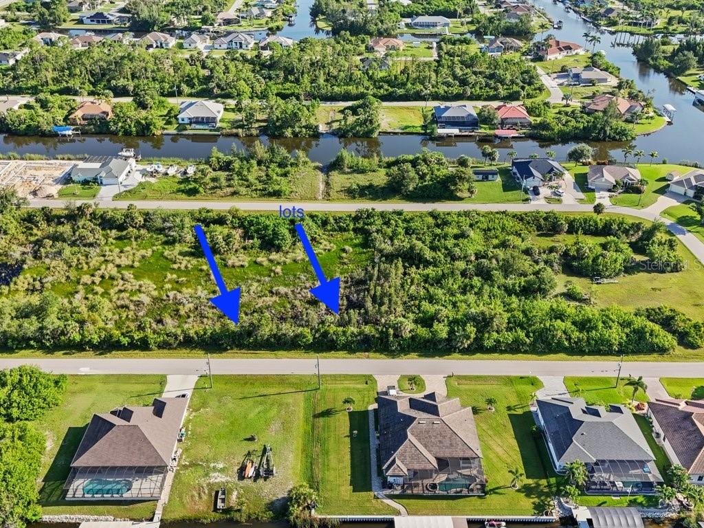 Outstanding Opportunity for a beautiful double lot homesite, 15657 Hennipen is being offered with the adjacent lot (see MLS D6142978) in the Waterfront Gulf Access Community South Gulf Cove. BUILD YOUR NEW HOME! This vacant lot package provides nearly 1/2-acre of land featuring public water and sewer, power pole across the street, is designated as a NON SCRUB JAY Permit zone, which saves you $$$ when you build. Another great feature of this area is the availability of HIGH SPEED INTERNET SERVICE, Fiber Optic service is in place. This gorgeous parcel is situated on the interior of the circle across from waterfront homes in a quieter part of the neighborhood with easy access to the community amenities. The South Gulf Cove HOA is optional, and at only $120 per Year, you will enjoy meeting neighbors at the Clubhouse where you can enjoy recreational areas and lots of activities hosted there! Conveniently located between Punta Gorda and Venice, near world class fishing, Gulf beaches, Golfing, and an easy commute to regional and international airports. Price is per parcel. Call for information about local builders, and start living the Florida lifestyle!