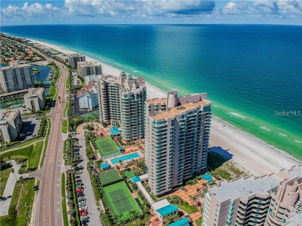 Welcome to your new Clearwater Beach condo where you will feel like you’re living in a paradise resort. FURNISHED, ANNUAL RENTAL ONLY. AVAILABLE AUGUST 1st. The Ultimar Condo offers an abundance of amenities including private beach access, 3 pools, one of which is a lap pool, 3 tennis courts, billiards room, club room, multiple spas, both dry and wet saunas, recently updated fitness center, putting green, club room, 24/7 manned security and more. When you enter into your condo, the elegant foyer will guide your sight into the living area that overlooks the sweeping views of the powder sand and the crystal ocean at Clearwater Beach. The master bedroom features a luxurious spa tub, stand-up shower, dual sink vanity and walk-in closet. The wrap-around balcony of the master bedroom provides views to the east and south so you’re sure to enjoy gorgeous sunrises over the intercostal waterway. After a day at the beach or exploring all that Clearwater has to offer, you’ll know you've made it when you’re watching sunsets from your 11th-floor balcony with a nice glass of wine in hand. The condo is located in Sand Key of World Famous Clearwater Beach and is convenient for local restaurants, shopping and activities; and only about a 35 minute commute to Tampa International Airport. There is a covered parking space, and a secured storage unit included. Call today to schedule a private showing.