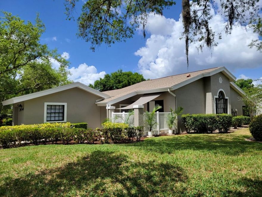 This home is "MOVE IN READY"!  Recently remodeled, featuring two bedrooms and two bathrooms, blending modern finishes with classic design. As an end unit, the villa boasts soaring vaulted ceilings and abundant natural light, creating a spacious and serene atmosphere. The open layout, enhanced with luxury vinyl flooring, is ideal for entertaining. The kitchen, designed for any home chef, features new shaker-style cabinetry, white quartz countertops, stainless steel appliances, a subway tile backsplash, and a breakfast bar. Fun accent lighting in the kitchen and lanai offers dimmable, colored options to suit your mood.

Designer touches abound, including modern ceiling fans, freshly painted neutral walls, new window blinds, and updated lighting throughout. Both bathrooms are bright and clean, with new vanities, sleek quartz finishes, contemporary fixtures, and updated tub and shower surrounds. The split floor plan ensures privacy in each bedroom, both offering generous closet space. This block constructed home also has a new roof installed in 2024, providing added protection and peace of mind. 

Hampstead Heath is characterized by tree-lined streets and mature landscaping, offering maintenance-free villa living and a friendly neighborhood atmosphere. The HOA recently installed new roofs, painted exteriors, updated courtyards, and resurfaced the heated pool, all while maintaining strong financial health. The Meadows community is centrally located has plenty of wildlife preserves, water features, and miles of nature trails. Despite its tranquil, park-like setting, it is just minutes from Benderson Park, local shops and eateries. The Meadows Country Club offers, golf, tennis, paddle ball, a pool and fitness center. It is important to emphasize that everything in this villa is brand new—unlike many listings that are merely "updated" or "renovated" over the years. The next owner will be the first to enjoy this comprehensive renovation, which includes new A/C system, new kitchen, new bathrooms, new roof and more.