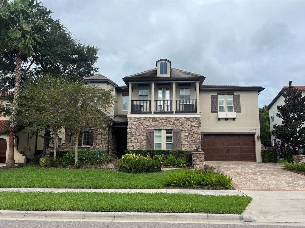 Photo of 12927 Canopy Woods Way, Winter Garden, FL 34787 (MLS # S5136184)