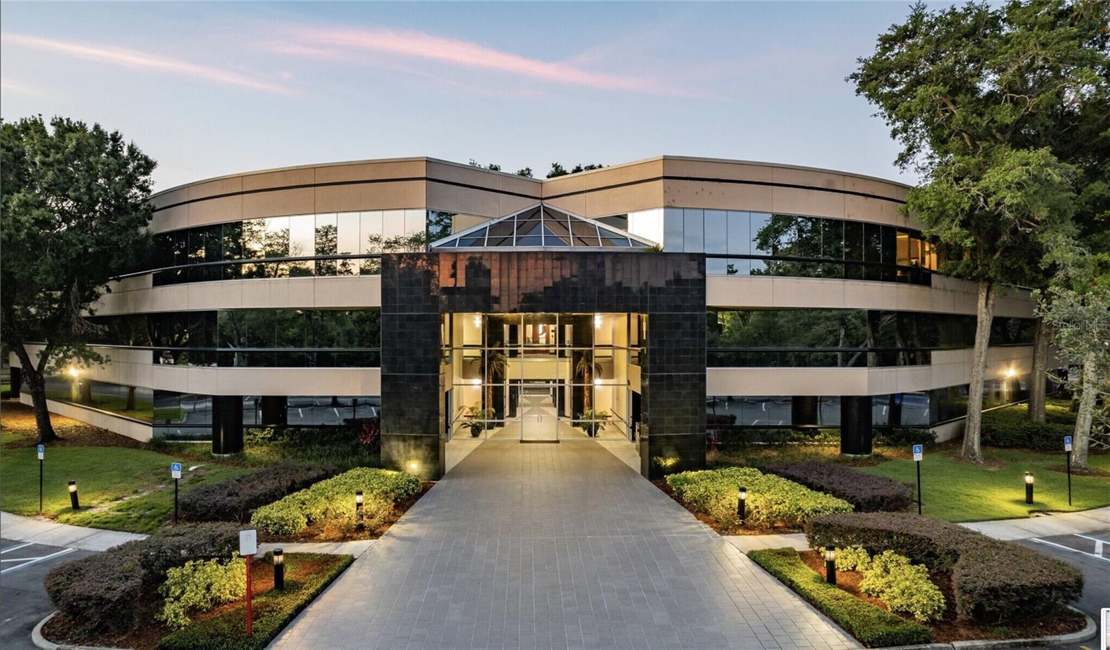 Welcome to Casselberry Corporate Center, conveniently located next to Maitland, Winter Park, and Lake Howell. This Class A office center offers an impressive 83,520 SF of total building space, with 80,035 SF of leasable square footage and is situated on a sprawling 351,106 SF, 8.06 acre lot. This property is strategically situated just off SR 436, offering excellent visibility with an impressive traffic count of 54,000 vehicles per day. The subject property has undergone over $1 million in significant recent upgrades, including upgraded LED lighting and flooring in nearly all units, a remodeled lobby and common areas, new HVAC, new lot paving, upgraded bathrooms, a new tenant directory, LED lights in the parking lot, all new irrigation plus landscaping and much more. The property is turn-key ready and move-in ready to operate. This 8.06 acre office site features a picturesque, park-like setting adorned with mature trees, an inviting outdoor seating area, and convenient proximity to convenience stores and restaurants, as well as direct access to Orlando International Airport via Semoran Blvd. This meticulously upgraded office space offers a prime investment opportunity in a thriving location. This corporate office center is priced to sell at $143 per square foot. This building is perfect for an owner-user corporate headquarters or an investor. Strong tenant mix with space available. Projected cap rate is 9.5% once fully leased. As of 01/01/2025, An owner can promptly occupy the entire 3rd floor, which spans 29,732 sq ft, along with additional spaces on the first and second floors, totaling 45,312 sq ft. Located in a prime area close to Winter Park and Maitland, two highly regarded sub-markets in the Orlando region, this opportunity represents an exceptional deal. Schedule your showing today!