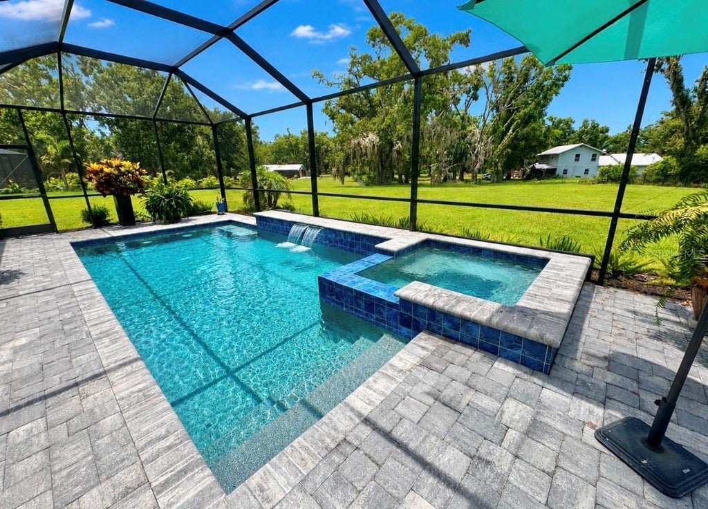 Photo of 5322 124th Avenue E, Parrish, FL 34219 (MLS # A4696886)