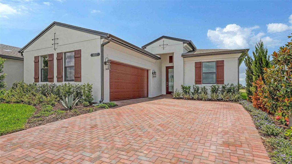 Photo of 14517 Coastal Woodland Lane, Parrish, FL 34219 (MLS # O6273736)