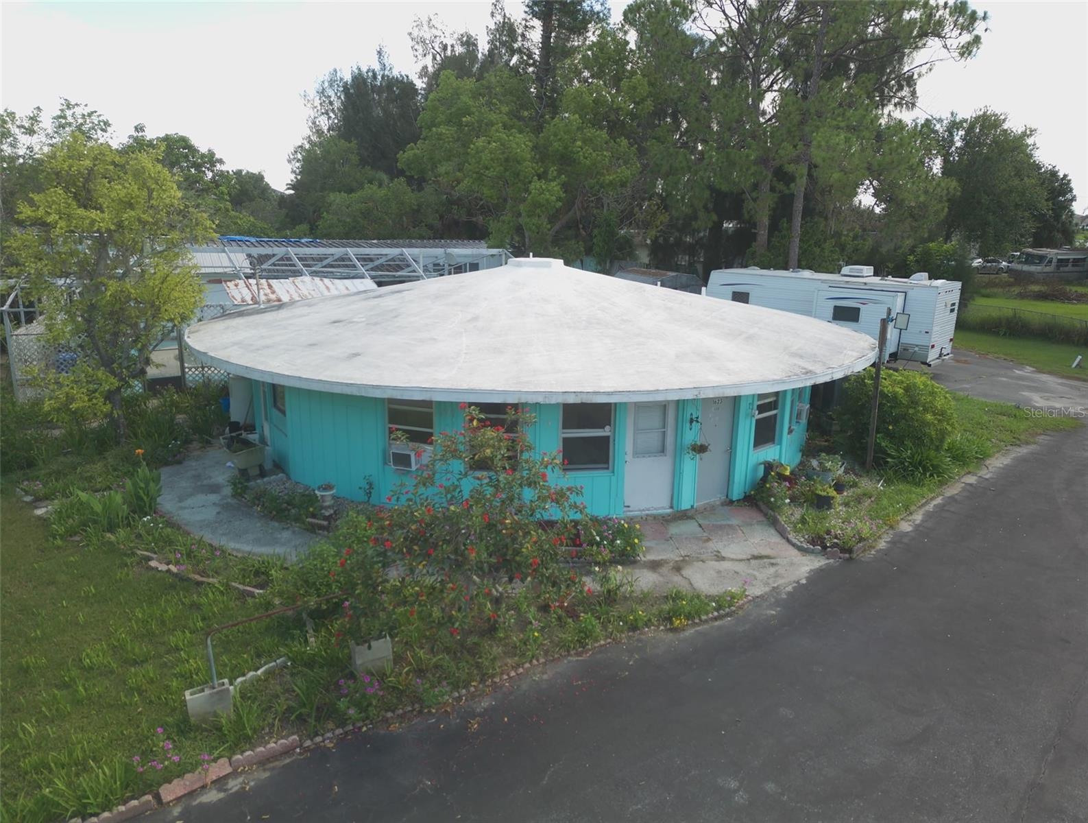 ALMOST 3 ACRES! VALUE IN THE LAND! 4 BUILDINGS IN GREAT NEED OF REPAIRS. FEMA HAS A 3 YEAR FLOOD INSURANCE THAT IS TRANSFERABLE AT CLOSING TO NEW BUYER. POOL IS NESTLED IN REAR OF 1ST BUILDING. 3 MOBILES THAT FLOODED EACH WITH OWN ELECTRIC POWER AND SEPTIC TANKS. WATER IS FURNISHED ON ONE METER COUNTY WATER PLUS A WELL. COMMERCIAL MIXED USE ON FRONT PARCEL, REAR IS AR.PICTURE YOUR BUSINESS HERE, LENDS ITSELF TO MOBILE HOMES, ALL FACTS TO BE VERIFIED BY BUYER. SURVEY IS FROM YEARS AGO. A STRIP OF LAND ALONG NORTH BOUNDARY WAS SOLD TO THE SUBDIVISION BEHIND PARCEL, SO SURVEY NEEDS TO BE REDONE. PEACE AND QUIET, NO INTERSTATE NOISE JUST MADE FOR YOUR BUSINESS AND HOMES. PLEASE CALL AND I WILL BE HAPPY TO SHOW. APPOINTMENT NEEDED AS FAMILY STILL LIVES HERE! NEW SURVEY NEEDED TO VERIFY EXACT MEASUREMENTS.