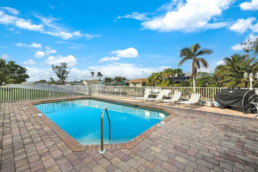 Photo of 403 SW 47th Ter #203, Cape Coral, FL 33914 (MLS # TB8439571)