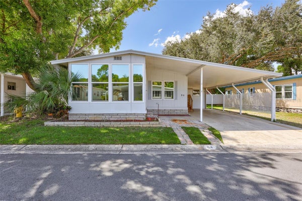 7777 46TH AVE N LOT 84, SAINT PETERSBURG, FL 33709 - Image 279bb6bca907c7d87cfe129f5ccc8f5d/1682722154