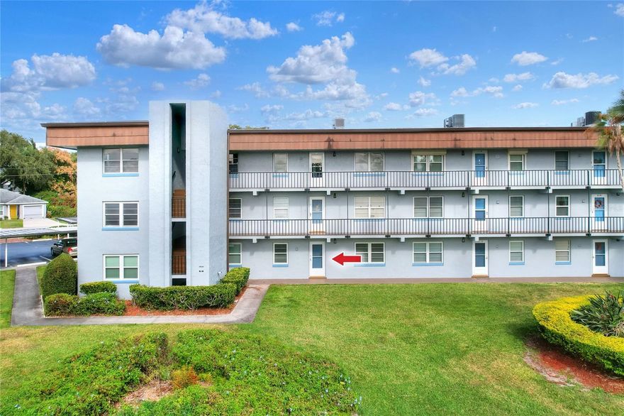 First Floor condo offers comfortable, low-maintenance living with numerous updates throughout. The kitchen features a new backsplash, new sink and faucet, freshly painted cabinets, and newer appliances, including the refrigerator and dishwasher. A new water heater adds additional peace of mind.  Both bathrooms have been updated with new vanities, faucets, and tile backsplashes. Custom wood shelving has been installed throughout the home—no wire shelving—along with custom closet organizers in both bedrooms. The spacious primary bedroom features beautiful plantation shutters.  Stylish barn doors enclose the laundry area with a washer and dryer, and the hall closet. Covered parking included.  Situated on scenic Lake Howard, part of the famous Winter Haven Chain of Lakes, this community offers boat dock access. Residents also enjoy a sparkling pool, gazebo with grilling area, shuffleboard courts, and a quiet, secure atmosphere.  Even better, the HOA covers cable, internet, water, sewer, trash, exterior maintenance, and lawn care—you only pay for electricity. Truly affordable, maintenance-free Florida living.