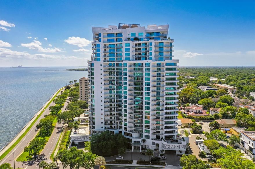 This Penthouse Estate Residence in Virage Bayshore encompasses ½ afloor that has been designed and furnished to take full advantage of the location’s breathtaking panoramic views of the water and the casual elegance of Florida’s year round, indoor-outdoor lifestyle. There’s no place like home, especially when it looks, feels and lives like this with luxury finishes, private foyer, wine fridge, wet bar with beautiful tile backsplash & wine fridge, two master custom closets, gorgeously appointed bathrooms, contemporary kitchen w/bar seating, 2 reserved parking spaces, separate laundry with storage, and a gas grill on the expansive balcony to enjoy sunrise and sunset. The Virage is a luxury high-rise featuring 24/7 concierge, pool overlooking Bayshore, spa, grilling area, fire-pit, club room, meeting room, a large gym, massage room, private dog walk, dog spa, bike room, air conditioned storage, and 2 guest suites which can be reserved for your guests. Come live the lifestyle you deserve at the Virage Bayshore!