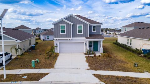 Photo of 634 Bell Prairie Circle, Lake Wales, FL 33859 (MLS # O6385045)