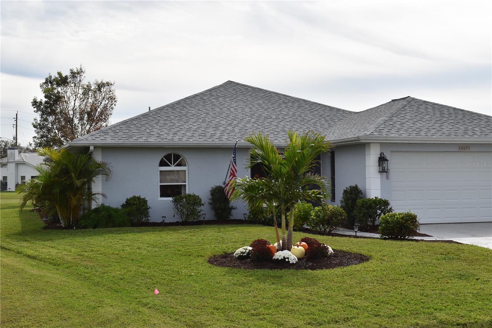 Beautiful Deep Creek home with excellent lot position to give you a large, lush green, rolling lawn in the back yard, making it just right for entertaining and relaxing. Deep Creek is a sought after, deed restricted neighborhood. All of the homes are well landscaped and inviting. This home has all the attributes of a new home with many upgrades. It has been professionally renovated from top to bottom. It has 3 good sized bedrooms and two full baths featuring white shaker vanities with marble tops and beautiful porcelain tile to compliment. The kitchen has white shaker cabinets, granite counter tops and new stainless steel appliances. The house features an open floor plan, with sliders in the family room area and the master bedroom leading to the large lanai with all new screening and supports. There is a two car garage with
lots of storage space. The roof is 6 years old and there is a brand new HVAC installed a month ago. Not in a flood zone.
