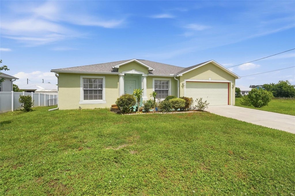 Photo of 4102 10th Street W, Lehigh Acres, FL 33971 (MLS # C7530936)