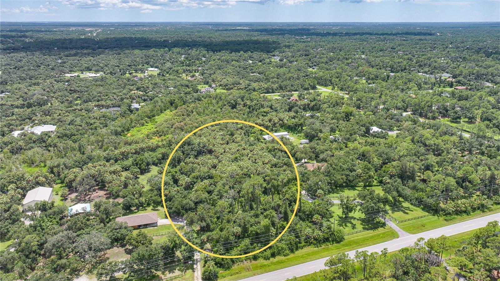 Don’t miss this rare chance to own over 3 acres in North Port Estates! If you’ve been dreaming of wide-open space to design your perfect home, ranch, or retreat, this property checks all the boxes! This location is a gem for anyone who loves the outdoors. Horseback riders will appreciate being just minutes from Myakkahatchee Creek Environmental Park, where miles of shaded trails wind through natural Florida beauty and even connect into Myakka State Park. Cyclists will love the convenience of the Legacy Trail’s new North Port extension, offering a seamless ride all the way toward Venice and Sarasota. Whether you enjoy biking, hiking, or simply being surrounded by nature, it’s all right here. At the same time, you’re never far from modern conveniences. Quick access to I-75 makes commuting a breeze, and in under an hour you can be relaxing at some of the Gulf Coast’s most beautiful beaches. Baseball lovers will enjoy CoolToday Park, the spring training home of the Atlanta Braves, plus the area’s endless shopping, dining, and entertainment options. Best of all? There are no deed restrictions, no HOA, and no CDD fees—giving you the freedom to bring your vision to life without limits. Large parcels in North Port Estates are becoming harder and harder to find. If you’ve been waiting for the right one, this is it. Call today before it’s gone!