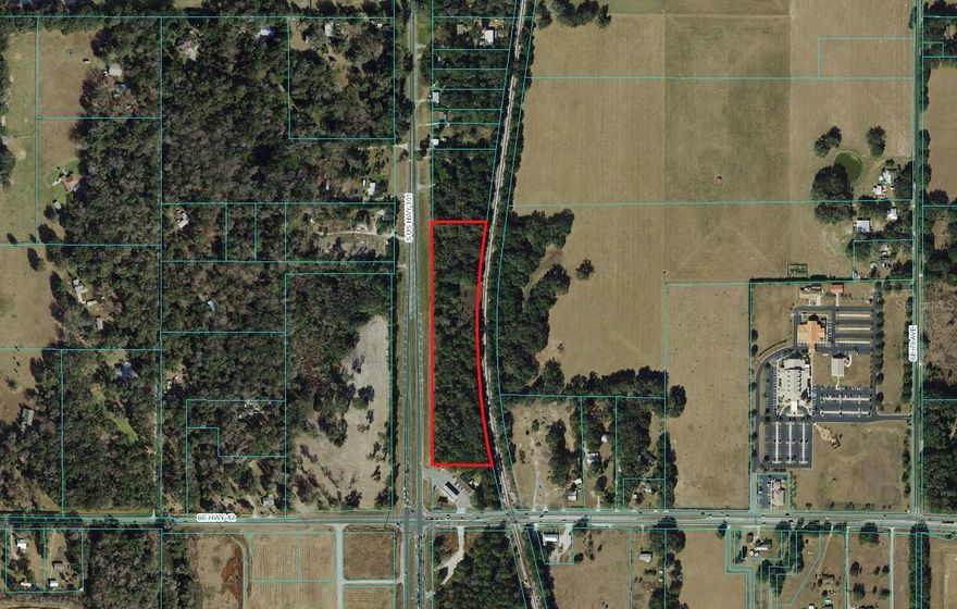 Incredible development opportunity on 6 acres with 950’ (+/-) of highway frontage!  New 7-Eleven and Marion County Medical Examiner’s office located at SW corner of Hwy 301 & 42.  Property has 4 acres zoned M1 and 2 acres A1.   Located less than one mile from The Villages with possible access from busy signalized corner of Hwy 42.  Convenient to I-75 and Florida Turnpike. Located in Marion County, Parcel ID 48378-000-00, the north 6 acres of subject ~8 acre parcel is available.  AADT is 17,500 trips per day/US Hwy 301, 13,500 trips per day/SE Hwy 42 (FDOT-2024).