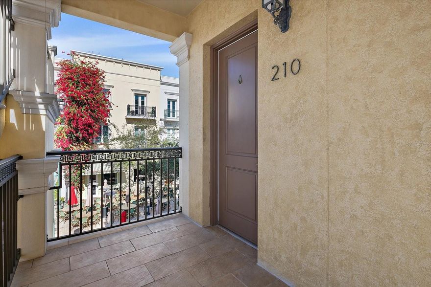 One or more photo(s) has been virtually staged. NEW PRICE!!  Now offered at $435,000. Ideally located in the heart of downtown Sarasota, this well-maintatined Citrus Square condominium offers elevated second floor living with a private balcony overlooking the courtyard and surrounding treetops. The residence features high ceilings, an open living and kitchen layout with granite countertops, wood cabinets, stainless appliances, and in-unit laundry. Solid concrete construction, secured parking, elevator access, and walkable proximity to restaurants, theaters, shopping, and the bayfront complete this inviting downtown lifestyle opportunity.
