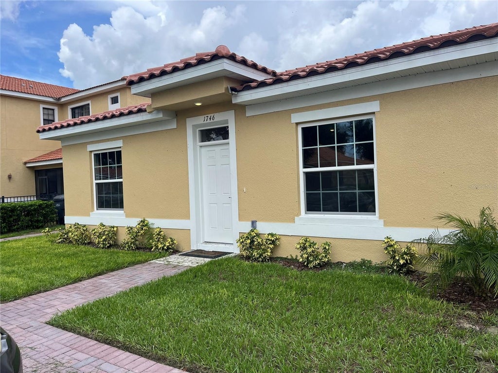 Photo of 1746 Coriander Drive #1746, Kissimmee, FL 34759 (MLS # O6442400)