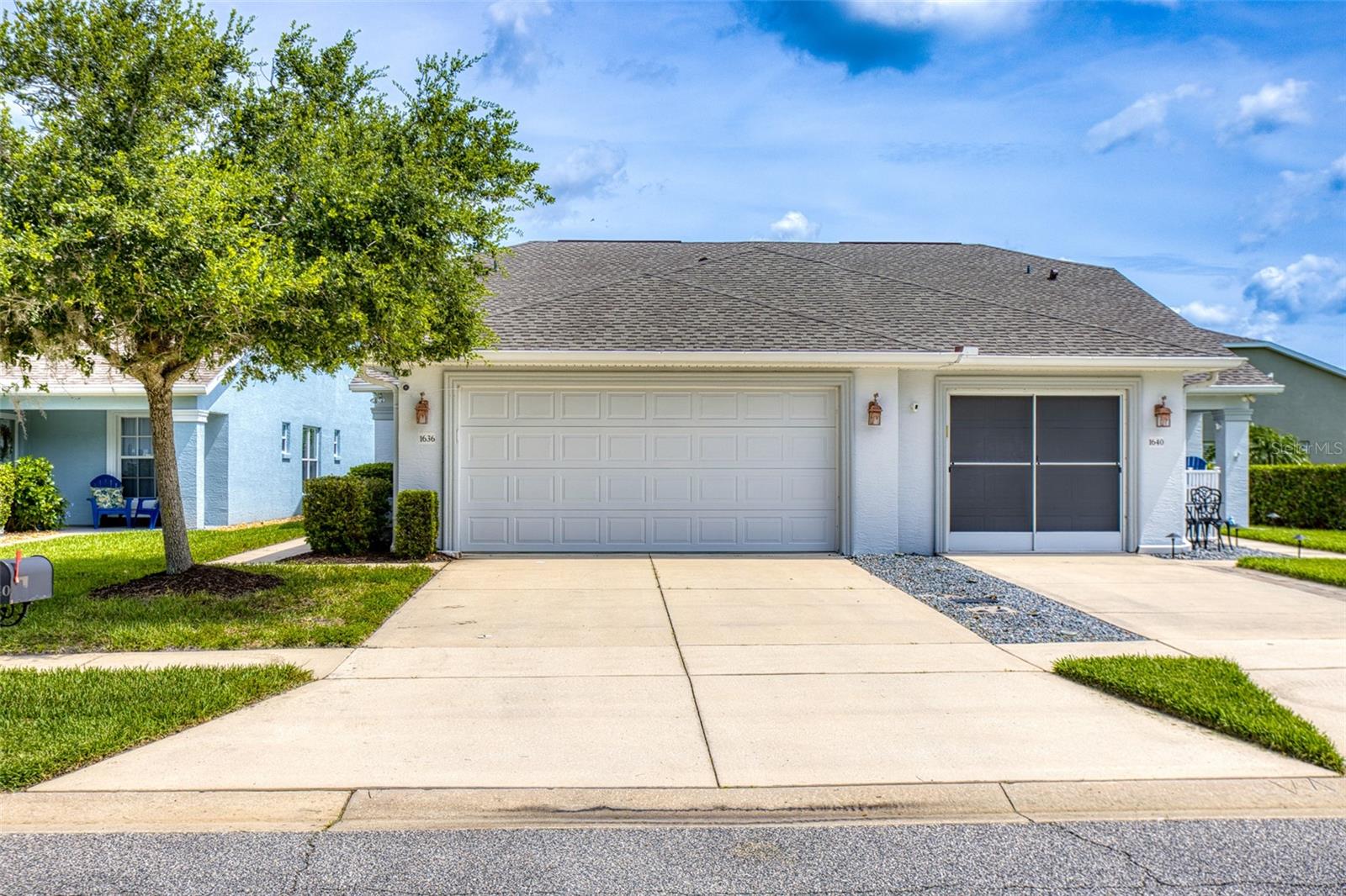 Maintenance-free living in the gated Villages of Royal Palm! An exceptional community offering luxurious resort-style amenities including a grand clubhouse with ballroom, catering kitchen with bar, game room with billiards and card tables, state-of-the-art fitness center, library, business center, 2 inviting pools, spa, tennis courts, shuffleboard, putting green, and horseshoes. This beautifully maintained property features 2 spacious bedroom en-suites and a 2-car garage. Step inside to be greeted by soaring vaulted ceilings and architectural details. Open concept living with a cozy fireplace and an additional den are perfect for multiple entertaining and relaxation areas. The kitchen is equipped with stainless steel appliances, custom wood cabinetry and backsplash, as well as a convenient pass-through to the dining area. Sliders lead out to the oversized covered screened patio which is perfect for sipping coffee in the morning or enjoying the evening after a long day. Additional features and upgrades include elegant and functional LVP flooring throughout, fresh interior paint, NEWER roof, NEW AC, NEW dishwasher and refrigerator, plantation shutters and a central vacuum system. The HOA fees cover lawn maintenance, annual mulch, trimming of shrubs & trees, spraying for weeds, fertilizer, pest control, annually pressure washing, exterior paint every 5 years, Cable TV & care of common areas. All sizes are approx. All information deemed accurate but cannot be guaranteed. Call for your private showing today!