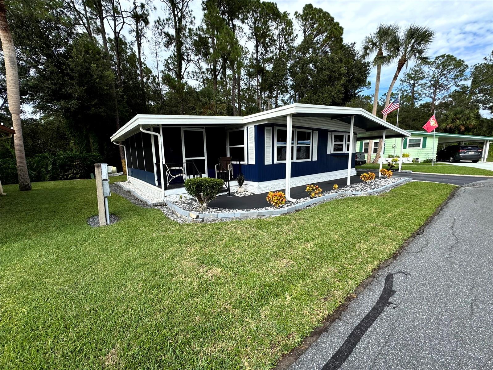 Updated Mobile Home: 2-bed, 2-bath, 1,242 sq. ft., backs nature preserve.
Open Layout: Kitchen-dining combo, large living room, screened Florida Room.
Master Suite: Spacious with walk-in closet, upgraded bathroom with walk-in shower.
Second Bedroom: Versatile with walk-in closet, ideal for guest room or office.
Storage: Shed with washer/dryer and ample storage space.
Sale includes Co-op Share (valued at $30,000); $185/month fees cover pool, shuffleboard, utilities, private boat ramp.
Community Amenities: Clubhouse with bingo, holiday events, bridge, potlucks, and more.
55+ community
Roof replaced in 2022
HVAC replaced in 2021 (central heat and air)