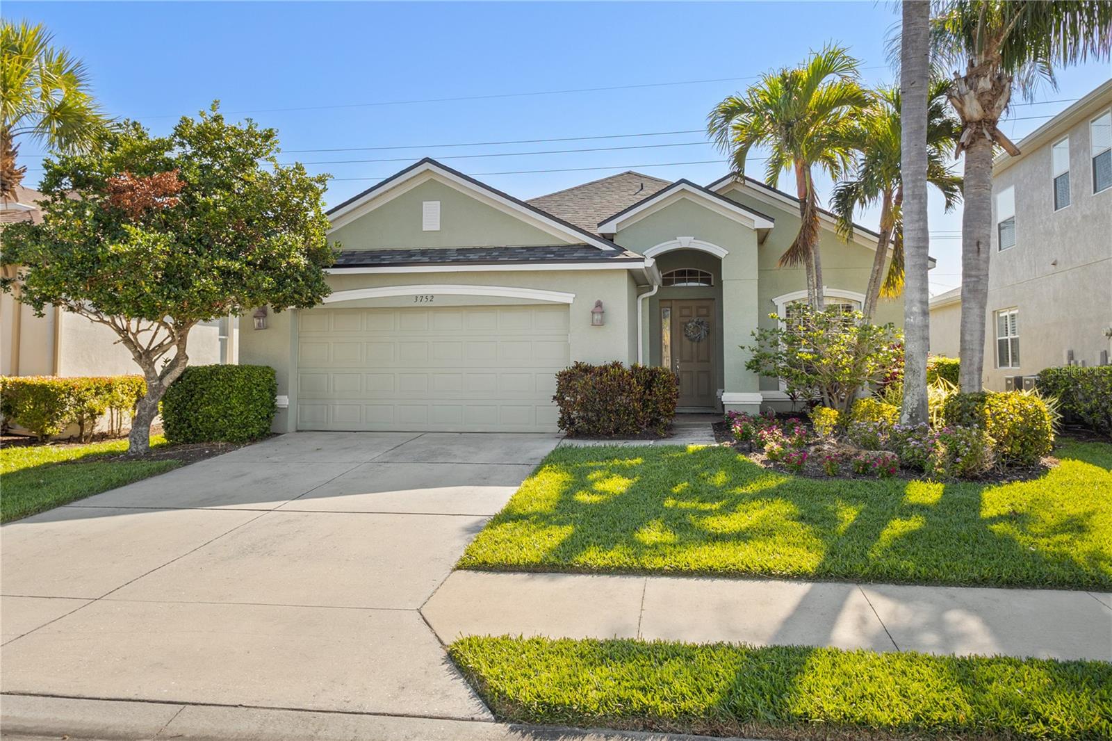 Nestled in the serene and sought-after Palma Sola Trace neighborhood, this beautifully maintained home offers the perfect blend of modern style and ultimate privacy with your own caged-in, heated, pool/spa in the backyard, complemented by a spacious covered outdoor entertaining area! Step inside to an open and airy floor plan, freshly painted in a crisp white, with luxury vinyl plank flooring in the main living areas – a sleek nod to coastal living. The great room features soaring ceilings and a separate dining area, creating an inviting space perfect for entertaining friends and family. The chef-inspired kitchen is a true highlight, complete with stainless steel appliances, custom wood cabinetry, and generous granite countertops – ideal for preparing meals for both large gatherings and intimate dinners. The spacious primary bedroom is a true retreat, offering a large walk-in closet and a ensuite bath with a garden tub, separate shower, dual sinks, and two additional closets for plenty of extra storage. The fourth bedroom is currently being used as an office, offering flexibility to meet your needs. Located in a maintenance-free community, Palma Sola Trace eliminates the hassle of lawn maintenance while offering resort-style amenities including a heated community pool, fitness center, playground, and clubhouse with gathering areas. Conveniently situated near shopping, dining, hospitals, and the world-renowned Gulf beaches, this home offers both relaxation and convenience. CDD fees are included in the annual tax bill for the property.