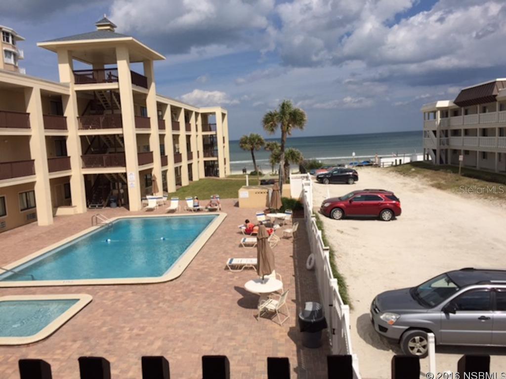 Unit #201-202. Condo/hotel Complex. Unique management plan allows owners to use each unit up to 120 days per year. Owner's expenses are paid from rental pool revenue/ Profits are distributed monthly. There are charges for owner or guest use depending on whether it is high season or low season or special event times. The fees are for utilities, daily cleaning, and amenties. The unit can be used as both units or single units as they are independent of each other for usage. One is a king bed bath liv/kit area. The other is more or less a motel room with 2 Queens and a bath. In the center of all the activities, restaurants and on the ocean. This unit is direct ocean views, 2nd/top floor and end unit. You can't find a ocean front unit with a maid for this price and this flexibility. Let me explain the concept to you. ;LocationDescription: Condo ;Water: City