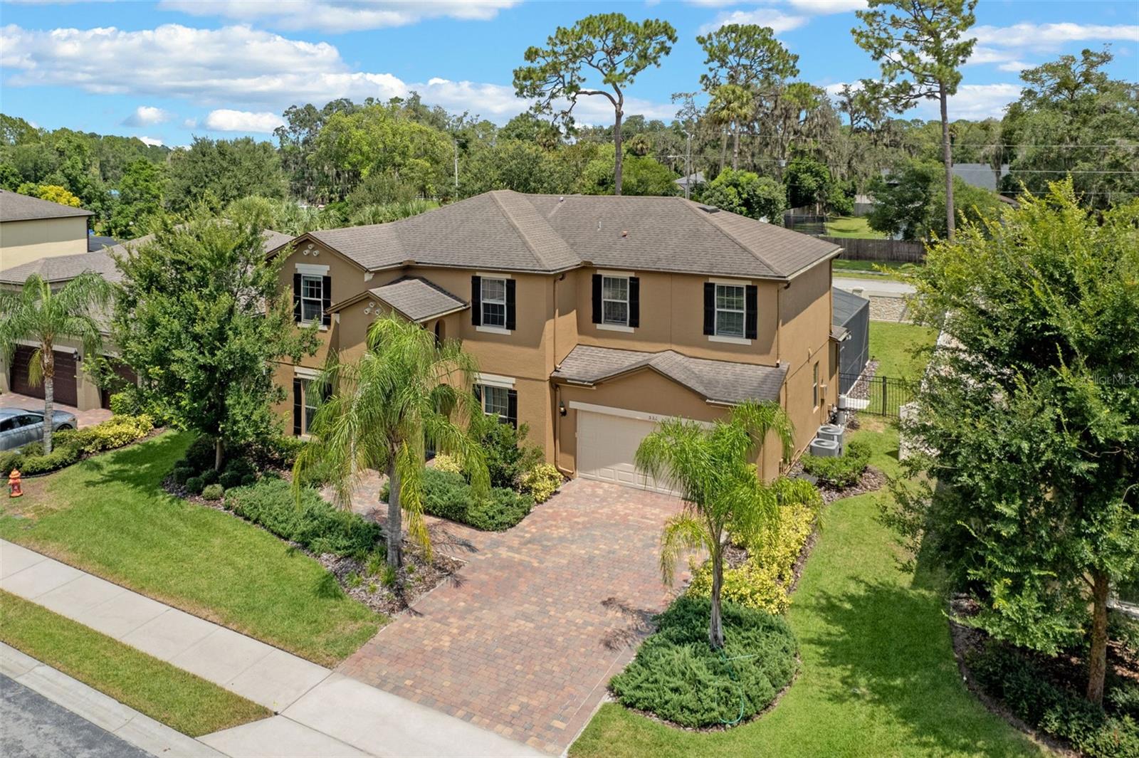 One or more photo(s) has been virtually staged. Welcome to your stunning Lake Mary dream home! This elegant, bright 5 bedroom, 3.5 bathroom gem is move-in ready. Nestled in the highly desirable gated community of Crystal Reserve right off Lake Mary Blvd, this home is less than 10 years old. Enjoy the high-end features of this bright and tranquil space.
Upon entering through the covered porch, you are greeted with tall ceilings, windows filtering tons of natural light, and an open floor plan that is perfect for entertaining. The first floor features a separate dining room, a spacious office, breakfast nook, tiled den with electric fireplace, a mud room, a guest bedroom, and 1.5 bathrooms. The gourmet kitchen offers granite countertops, built-in stainless steel appliances and an enclosed large pantry. Access the screened-in lanai through sliding glass doors and enjoy your beautifully designed saltwater pool (installed 2021) with waterfall features. Step outside of the large screen enclosure to a spacious and PRIVATE fenced-in backyard with NO rear neighbors.
Upstairs you will enter a large living area perfect for an upstairs den or play area. The expansive master suite features large windows, a spacious walk-in closet, an en-suite bathroom that includes his and her sinks with both a shower and jacuzzi tub. The 3 additional spacious bedrooms with walk-in closets offer generous growing space for your family. A separate laundry room is conveniently located upstairs as well.
Crystal Reserve is a highly desirable community in Lake Mary within walking distance of Uptown Lake Mary shops and services, and yet is insulated from traffic sounds. You will have easy access to 1-4 and the 417 Greeneway, highly rated hospitals, SunRail and a wide selection of shopping and restaurants. This home puts you within easy reach of downtown Orlando, Winter Park, theme parks/attractions, east coast beaches and the Space Coast. In fact, you can observe rocket launches from Cape Canaveral right outside your home!
Lake Mary was recognized as one of the Best Places to Live by Money magazine, with a warm small-town feel, hiking and biking trails on the 23-mile Cross Seminole Trail, the Wekiva River basin, and plenty of recreational activities. Seminole County Public Schools are highly regarded; buyers should verify school information directly.
This immaculate gem is move-in ready and a perfect place to create lasting memories. Schedule your tour today!