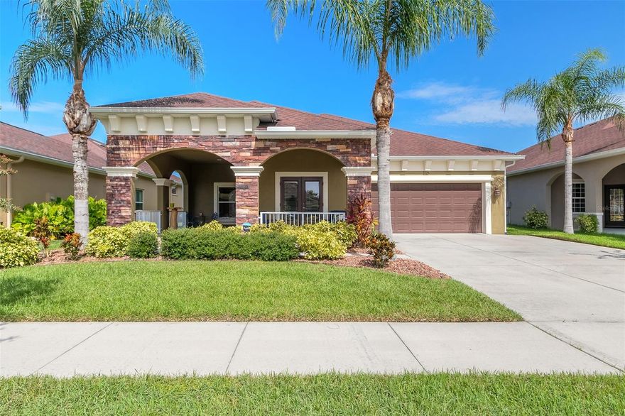 One of the most popular floor plans offered by Paytas Homes is this move in ready lakefront beauty. The home has 3 large bedrooms as well as a separate true office/den. The upgrades and features include, wood tile flooring,  high end custom cabinets, level 4 granite countertops, upgraded stainless appliances,  large screen rear lanai with captivating views of the lake, very large front porch and so much more. All information is intended to be accurate but is not guaranteed. ;Water: City