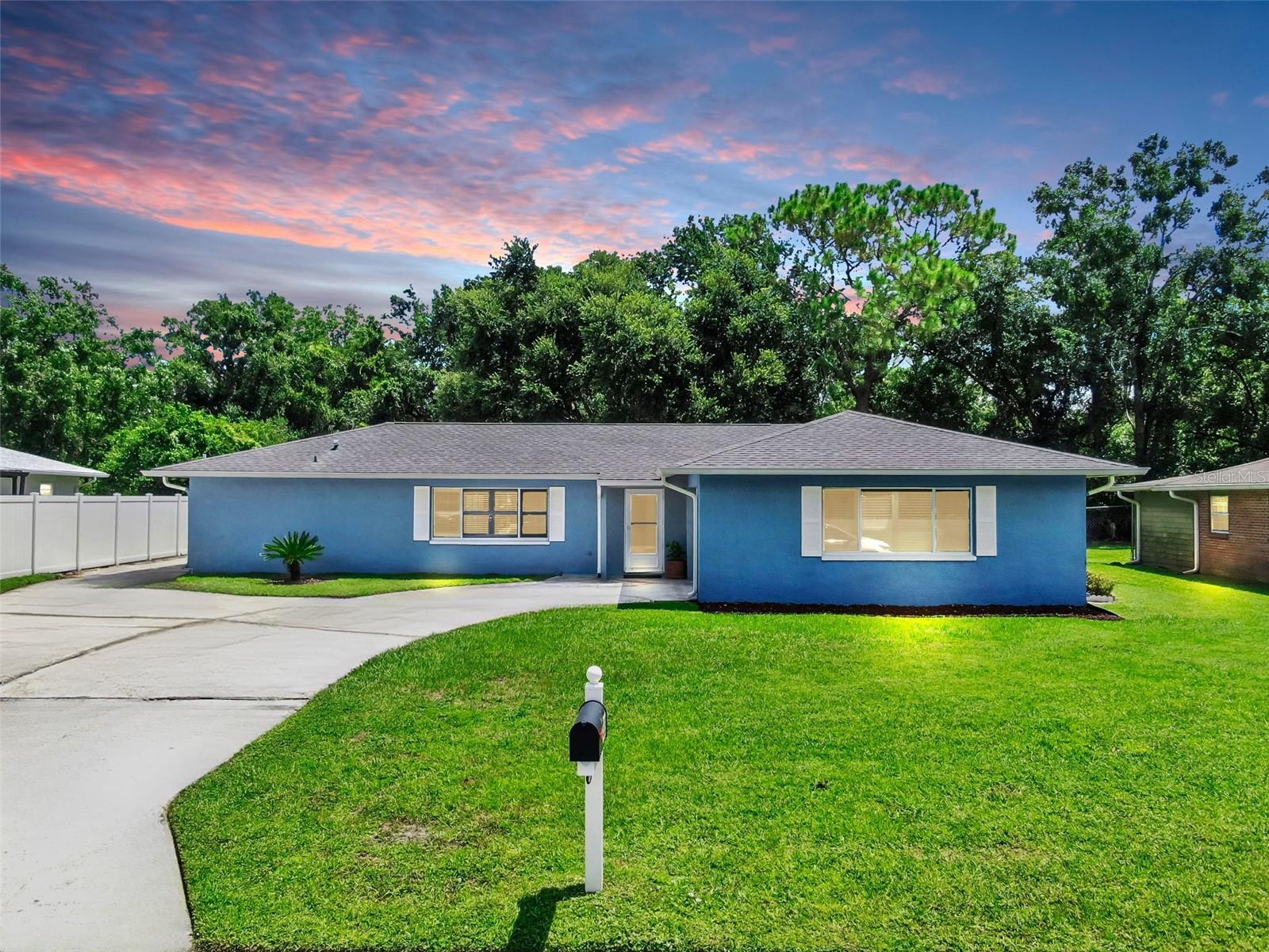 Welcome to 4638 Tampa Downs Blvd in Lutz, FL – a charming 3 bedroom, 2 bathroom ranch-style home featuring an open floor plan, fresh interior paint, and beautifully updated bathrooms. This home is ready for your personal finishing touches! The spacious primary suite includes a walkout to the screened-in patio, perfect for relaxing mornings or evening gatherings. Outside, enjoy a fully fenced yard along with a detached carport and workshop for added storage or hobbies. With no HOA and no CDD fees, this property offers both freedom and value. Conveniently located near shopping, dining, and just minutes from I-75, this move-in ready home is the perfect blend of comfort, convenience, and Florida living.