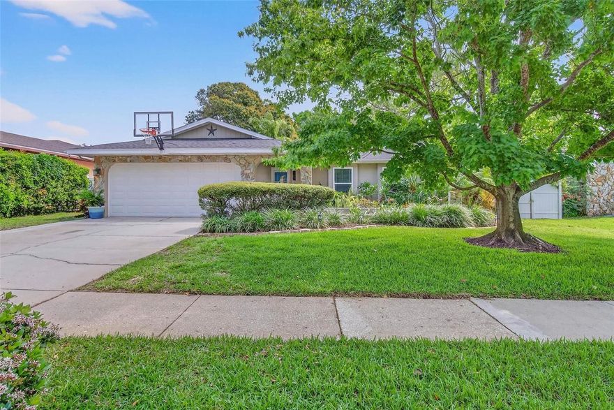 Located near Boca Ciega Millennium Park, this 3-bedroom, 2-bathroom split floor plan home is perfect for enjoying the outdoors while having quick access to the beach, restaurants, and shopping. Hop on the Pinellas Trail or take a scenic 15-minute bike ride to Indian Shores Beach. Relax in your spacious screened lanai and heated pool surrounded by lush trees for a true sense of privacy. The front entrance features a waterfall and pond, and the oversized backyard is fully fenced. Major updates include a brand NEW ROOF (2026), upgraded electrical, water softener, and pool heater. HURRICANE rated windows, sliders, and garage door give you peace of mind, and being situated near the water but in a non-flood zone is a huge plus. Multiple sheds on site, one being large and having electricity, and the two car garage is insulated well and has air conditioning.Top-rated Seminole Public Schools and the shops and restaurants of Seminole City Center are just minutes away. Come check it out!