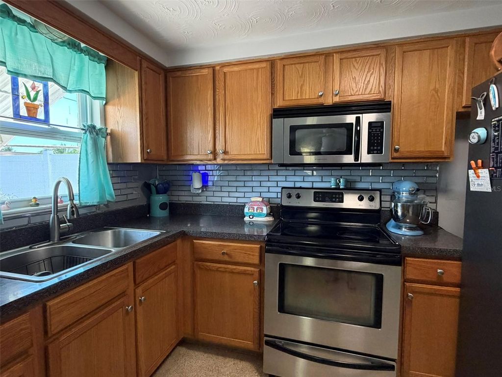 Photo of 3844 Redwood Drive, Holiday, FL 34691 (MLS # TB8438432)