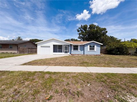 Photo of 15525 Bedford Circle E, Clearwater, FL 33764 (MLS # O6406382)