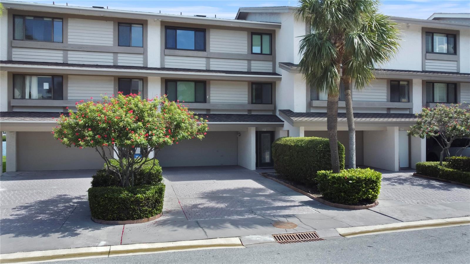 Welcome to Your Dream Townhome in Clearwater - Sand Key!Â
Step into this newly remodeled townhome and experience the epitome of luxury living. With a brand-new roof, PGT windows and doors, a modern kitchen, and state-of-the-art appliances, this home is a rare gem. The low HOA cost is just the cherry on top!Â
This spacious 3-bedroom, 2.5-bath unit also boasts a bonus 4th bedroom and full bath on the ground level, complete with a roomy two-car garage. Imagine waking up to breathtaking, unobstructed views of the Clearwater intercoastal, where dolphins and manatees play right outside your backyard.Â
The new dock is lift-ready to accommodate all your boating needs, with plenty of deep water access. Inside, you'll find fabulous upgrades like crown molding throughout, granite countertops, a dedicated coffee bar, soft-close cabinetry, and top-of-the-line stainless steel appliances, including a new dishwasher, range, microwave, and refrigerator. The new hurricane-rated PGT windows and sliding doors and water softener add an extra touch of luxury to your everyday life.Â
Just steps from your door, you'll find the beach and a heated community pool. The community also boasts a liberal pet policy and a 180-day minimum rental period.Â
Don't miss this opportunity to own a piece of paradise!
