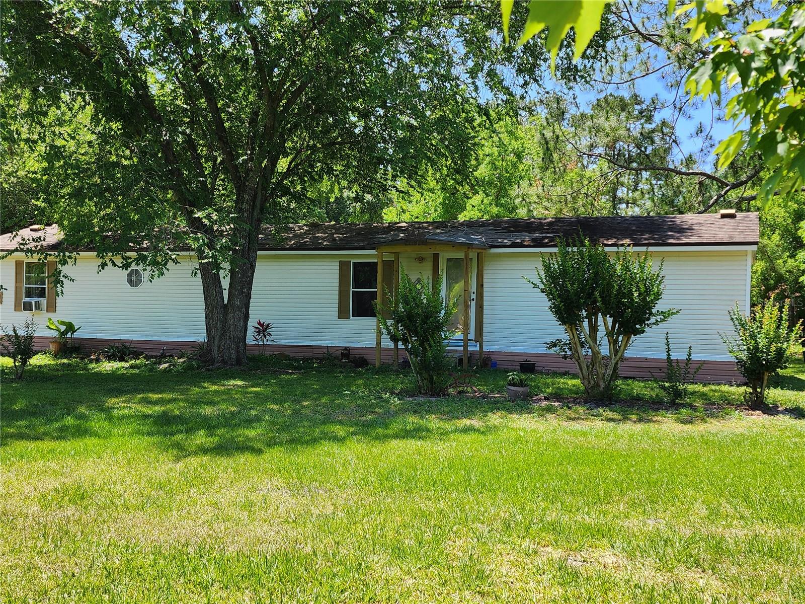 Photo 1 of 27 of 32202 CHIPOLA TRAIL mobile home