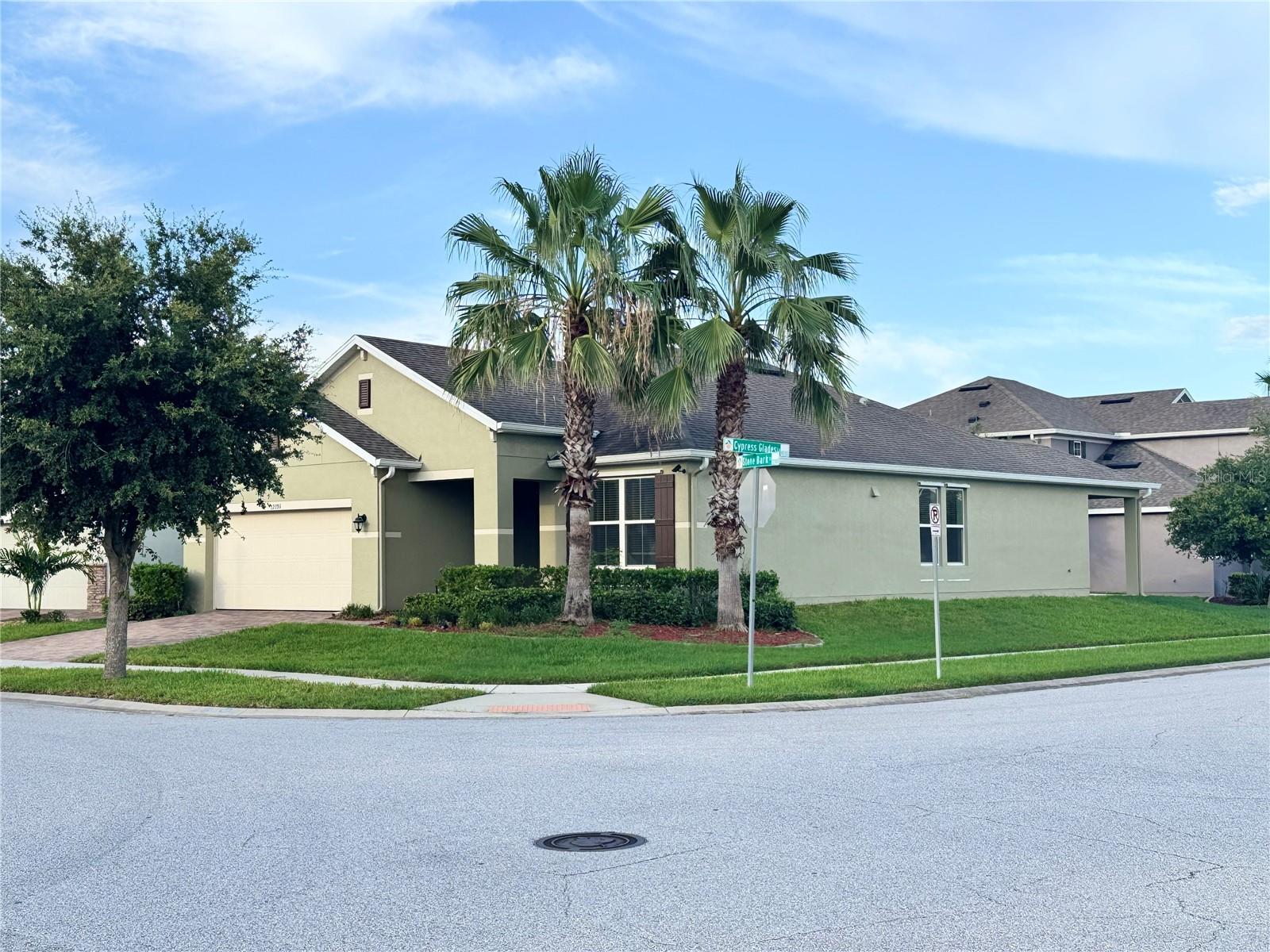 Immaculate Corner Lot Home in Prime Orlando Location – Potential 4 Bedrooms!
Welcome to this beautifully maintained one-story home on an oversized corner lot, located in the heart of Orlando—just 12 minutes from the Orlando International Airport, Brightline Train Station, and the thriving Lake Nona Medical City, including the VA Hospital, Nemours Children’s Hospital, UCF Medical School, and Pharmacy School.
Freshly painted inside and out, this home feels like new and features 3 spacious bedrooms plus a flex room that can easily serve as a 4th bedroom, office, or guest space, along with 2 full bathrooms.
Enjoy two comfortable secondary bedrooms with generous closet space, and an oversized master suite located at the rear of the home for privacy. The master includes a large walk-in closet with natural light and an ensuite bathroom with dual sinks, a soaking tub, and a separate shower.
The open-concept layout is filled with natural light, thanks to extra windows from the corner lot position. The chef-inspired kitchen boasts a massive granite island, 42-inch cabinetry, and stainless steel appliances, flowing seamlessly into a spacious living and dining area—ideal for everyday living and entertaining.
Step outside to a 10' x 10' covered lanai, perfect for relaxing or outdoor cooking. The expansive backyard offers plenty of room for family gatherings, pets, or future additions. Additional features include a utility sink in the garage, a recently serviced A/C unit, and ample driveway space.
Located near top-rated schools with quick access to major highways like the Florida Turnpike, 417, and 528, this home also enjoys low HOA dues of just $70/month, which includes access to a gated, resort-style swimming pool with 24-hour security monitoring.
Don’t miss the opportunity to tour this versatile, move-in-ready home with 4-bedroom potential, in a highly sought-after location—schedule your visit today