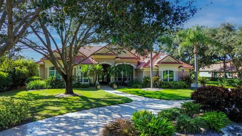 Photo of 453 E Macewen Drive, Osprey, FL 34229 (MLS # A4669572)