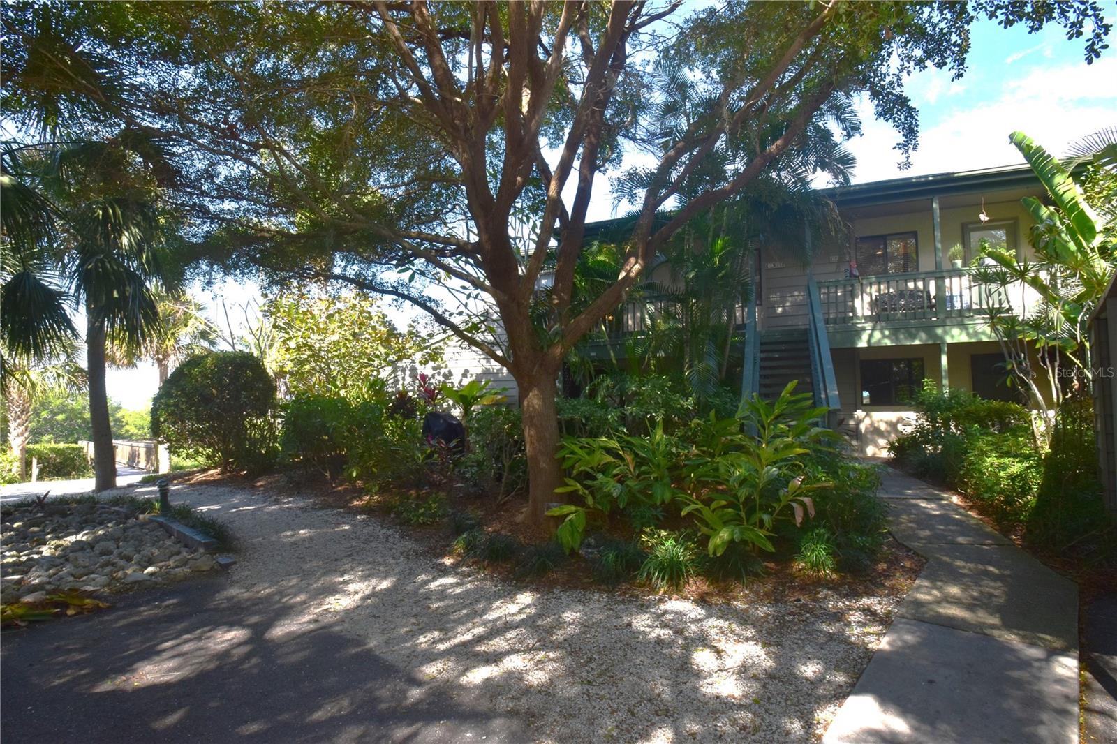 ***AVAILABLE NOW THRU DECEMBER 2025. AVAILABLE AGAIN MARCH 2026***. Second floor end unit 2 bedroom 2 bathroom bay view! Pelican Cove is a 75-acre gated, vibrant, waterfront community nestled among manicured tropical foliage truly offering something for everyone. Abundant amenities include an 86-slip boat harbor with sailboat water, excellent rates, and a launch dock for kayaks and canoes, 6 heated swimming pools, hot tub, 3 clubhouses, 4 lighted tennis courts, shuffleboard, basketball, dog walk area, 5.5 miles of walking trails and boardwalks as well as fishing gazebos, water exercise classes, exercise facilities, 2 art studios and a pottery classroom. Take classes at Pelican Cove University or join one of the more than 37 clubs for photography, fiber art, bike riding, yoga, Tai Chi, culinary arts, and card clubs. Woodworking, sculpting and evening jazz & classical music concerts round out the active lifestyle. Pelican Cove, the ultimate adult sanctuary, continues to be recognized and win awards for its landscaping and its superior management. Minutes from SIESTA KEY BEACH, restaurants, shopping, movie theaters and culturally rich downtown Sarasota. No Smoking, No Pets, No Motorcycles, and No Recreational