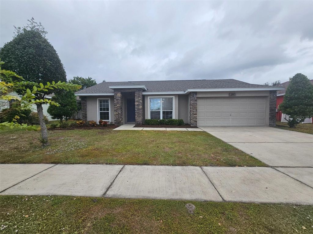 Photo of 308 Highland Meadows Drive, Davenport, FL 33837 (MLS # O6366353)
