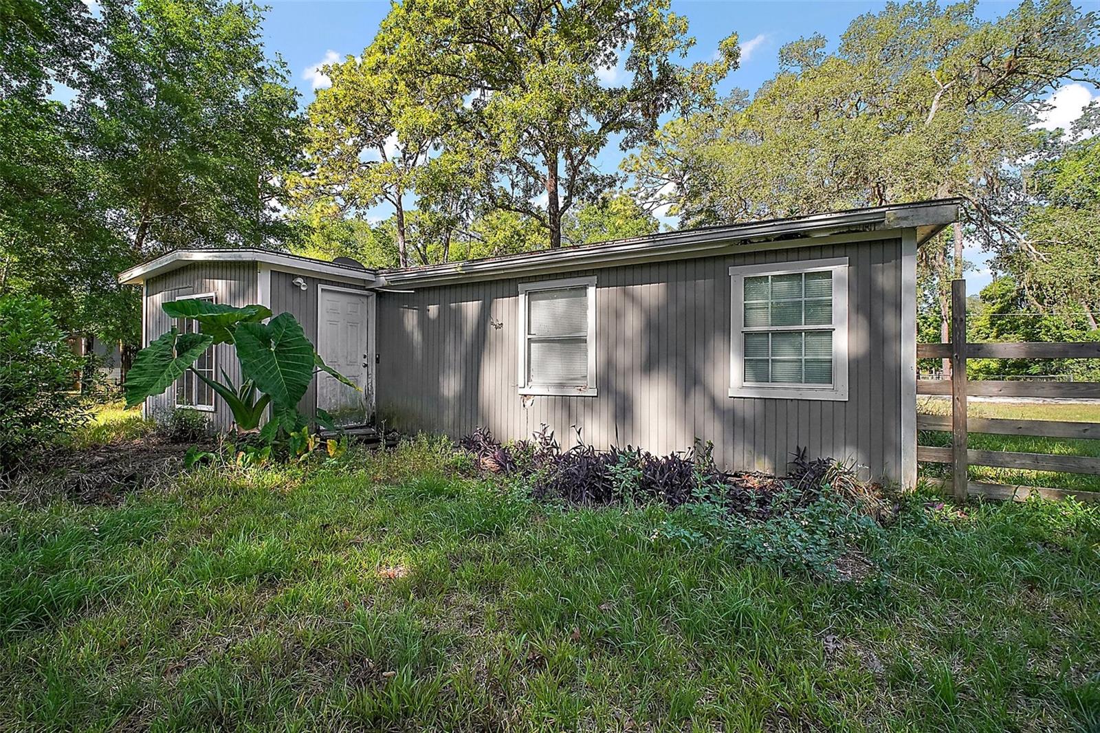 Welcome to this delightful two-bedroom, one-bathroom home nestled in the peaceful city of Silver Springs. Perfect for first-time buyers or those seeking a quiet retreat, this property offers a generous lot with endless outdoor potential.
As you step inside, you're welcomed by a functional kitchen featuring ample counter space and an in-kitchen laundry area for added convenience. Just beyond the kitchen is a spacious living room, ideal for relaxing or entertaining, and ready to become the heart of your home.
Outside, the expansive yard provides a blank canvas for your dream garden, outdoor living area, or personal oasis. A storage shed in the back offers additional space for tools, hobbies, or seasonal items.
Located just minutes from the natural beauty of Silver Springs State Park, this home combines tranquility with proximity to outdoor adventures and local amenities.
Don’t miss this opportunity to own a slice of peaceful Florida living—schedule your showing today and imagine the possibilities!