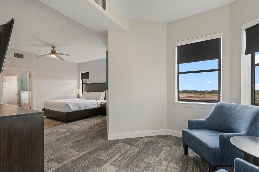 Photo of 14501 Grove Resort Avenue #2542, Winter Garden, FL 34787 (MLS # O6436045)